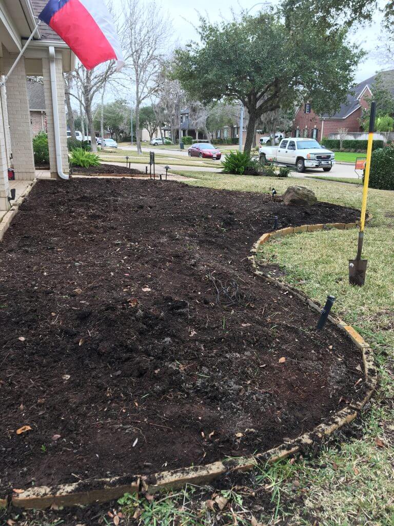 Empty landscaping bed ready for planting